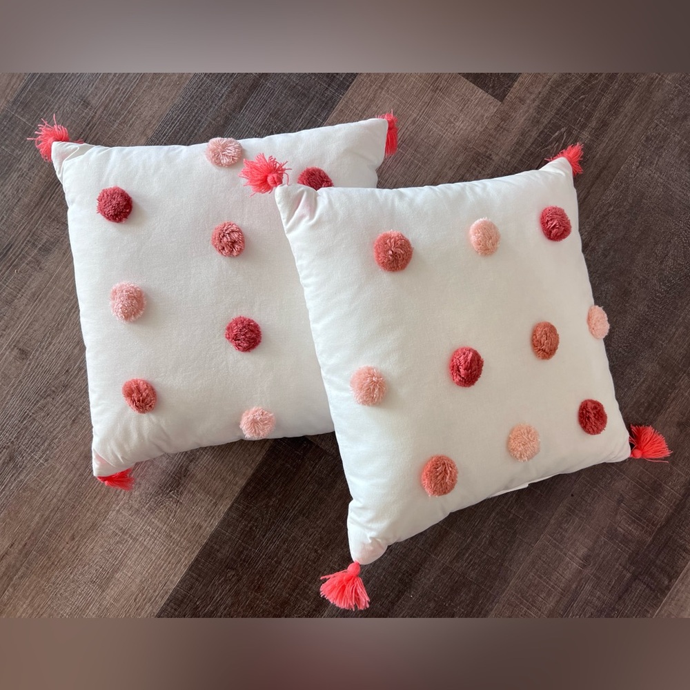Pillowfort White Pillow with Pink & Coral Pom Accents.